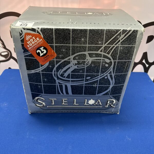 Front view of vintage Stellar 26cm stainless steel stockpot packaging.