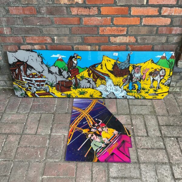 Vintage arcade perspex art panels with Western theme artwork.