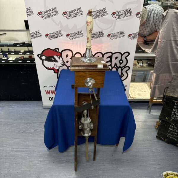 Vintage brass and wood beer pump for collectors.