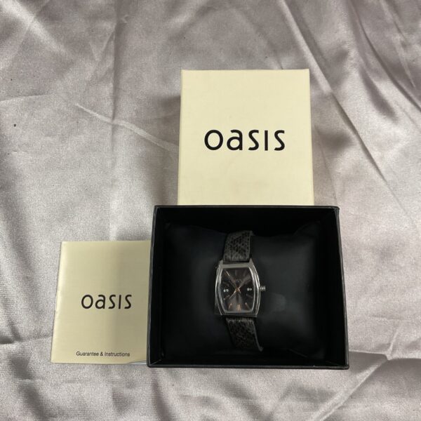 Silver and black Oasis ladies’ quartz wristwatch for auction.
