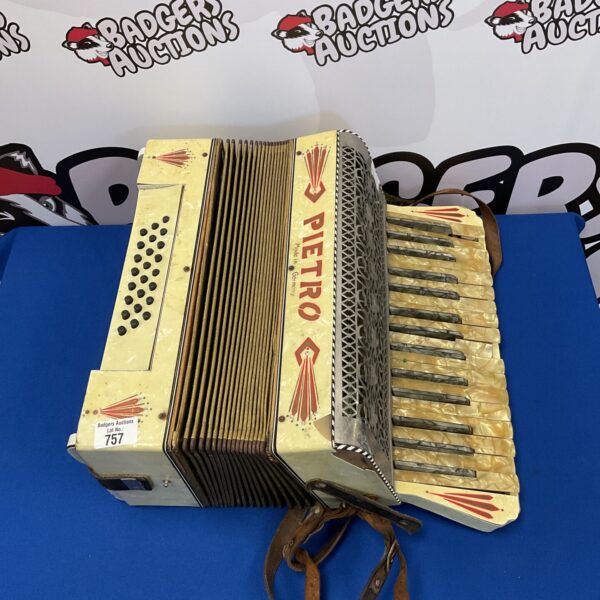 Vintage Pietro German accordion with pearloid keys.