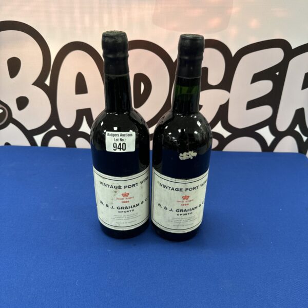Two bottles of vintage 1966 W & J Graham port wine.