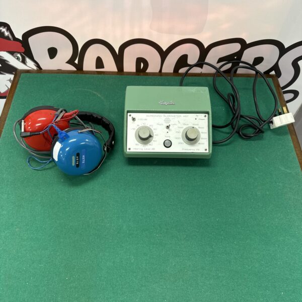 Vintage Bakelite headphones with adjustable earcups, a classic retro design.