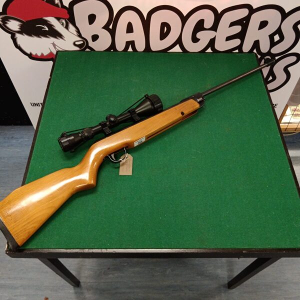 Vintage Webley Vulcan .177 air rifle with scope attached.