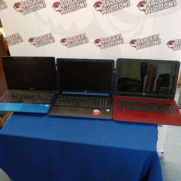 Lot of three used laptops including Samsung and hp.
