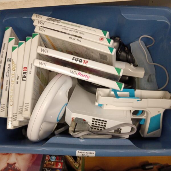 Nintendo Wii console with a selection of games presented in a blue container.