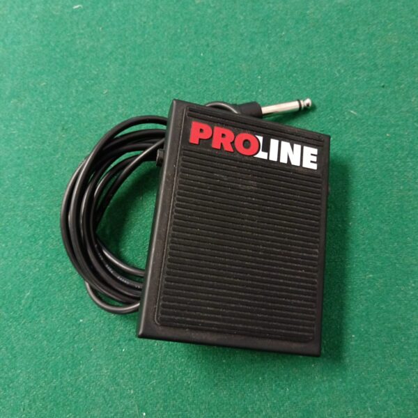Vintage Proline guitar pedal with cable, side view.