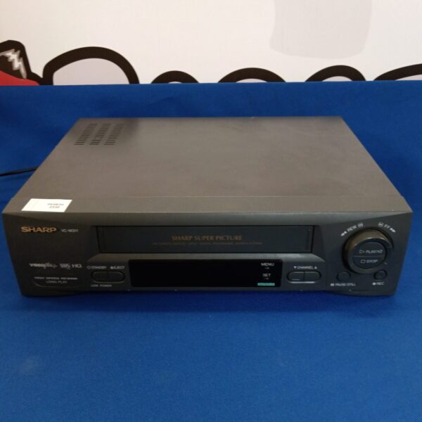 Vintage Sharp VC-M311 VHS player recorder in used condition.