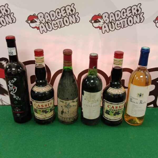 Mixed lot of six vintage wine bottles.