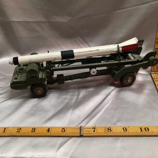 Vintage Corgi Major Corporal rocket launcher diecast toy vehicle.