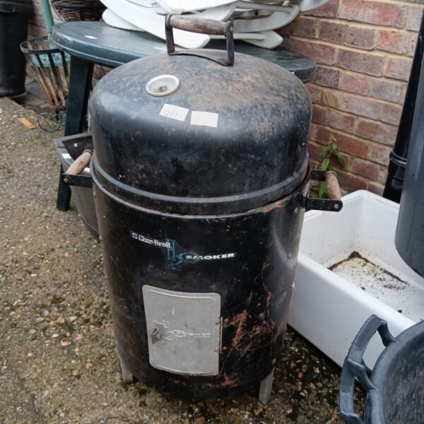 Vintage Char Broil smoker for outdoor BBQ cooking.