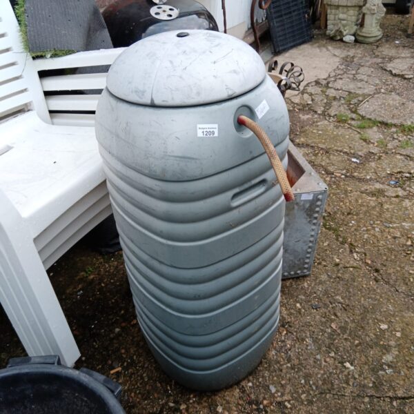 Grey plastic garden water butt for rainwater collection.