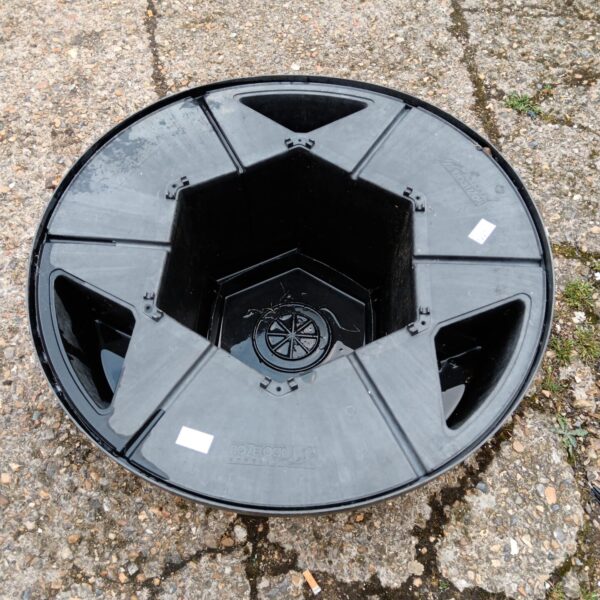 Black Hozelock Cyprio pond filter housing for water purification.