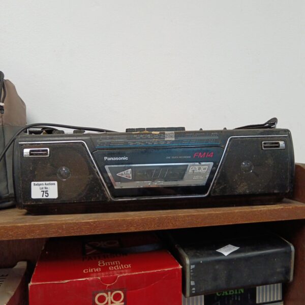 Vintage Panasonic FM14 stereo radio cassette recorder in used condition.