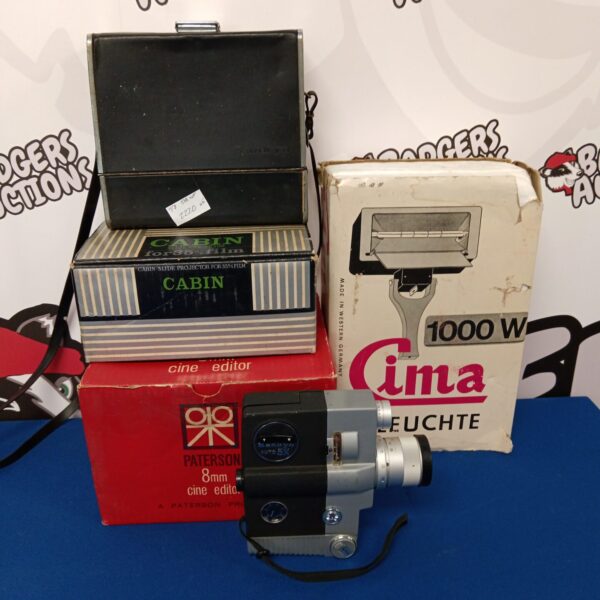 Vintage cine equipment lot including cameras and projectors.