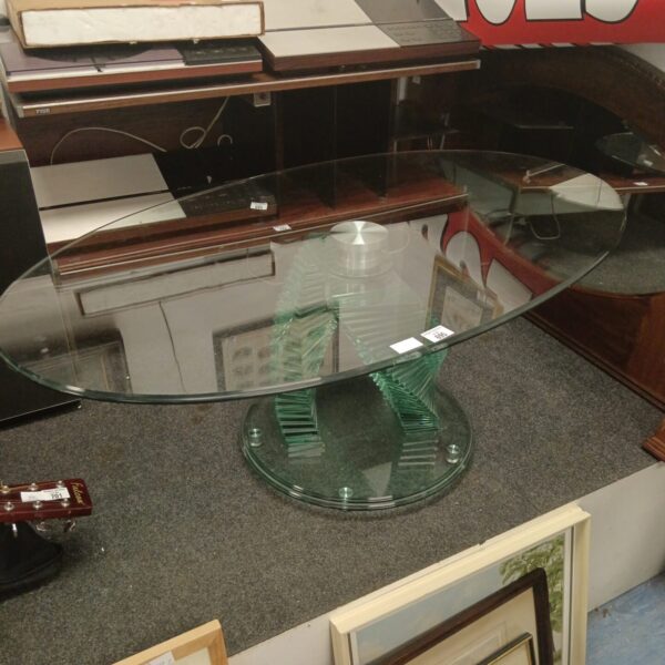 Vibrant green glass coffee table with chrome base.