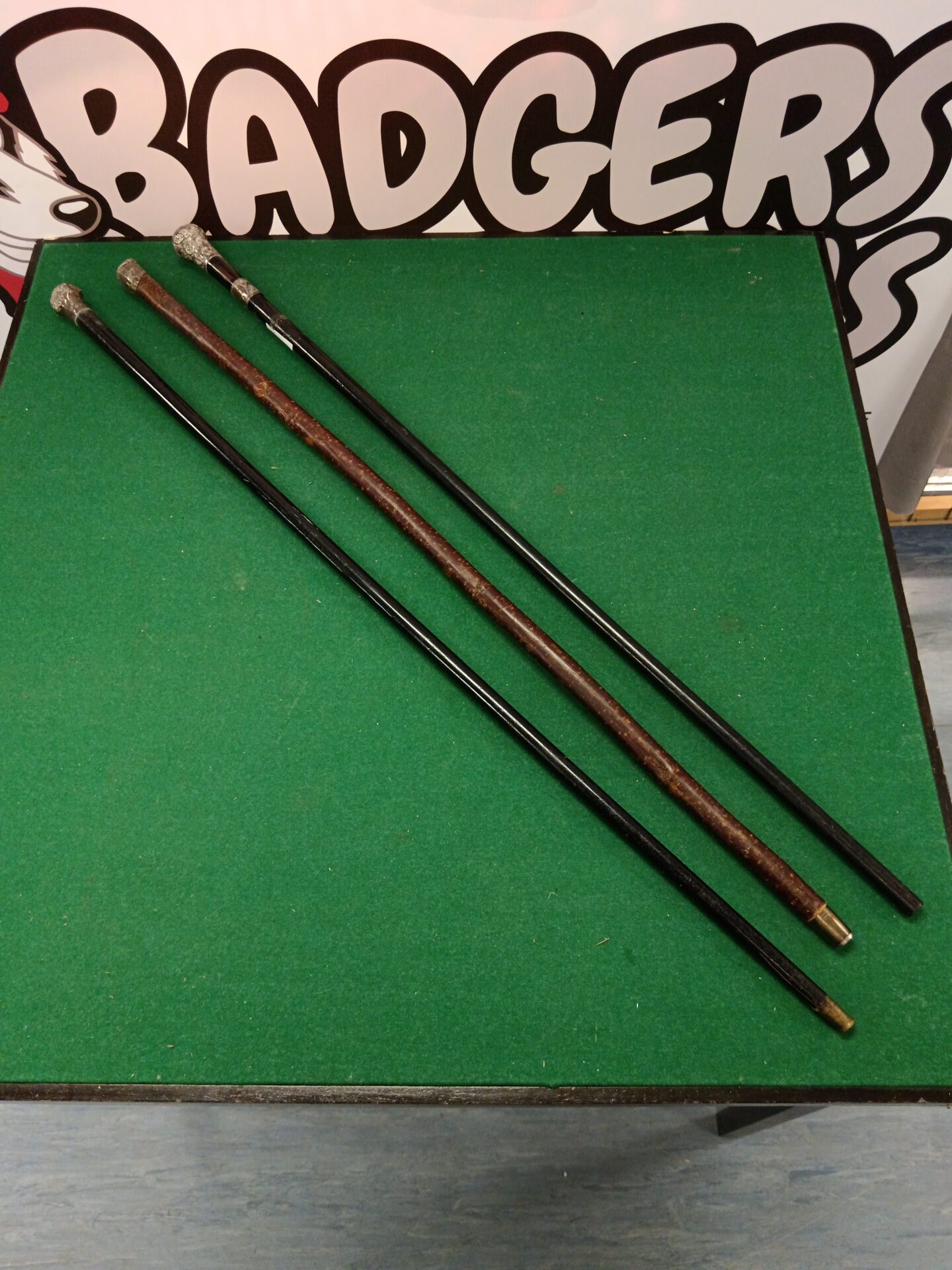713 Three vintage silver topped walking canes