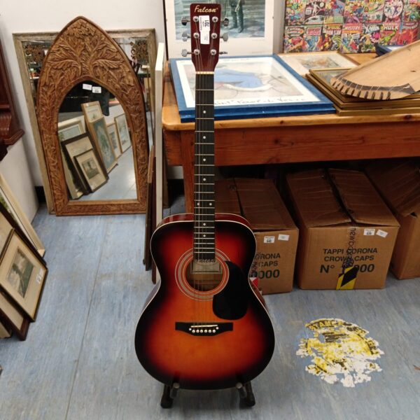 Vintage Falcon F300SB acoustic guitar with sunburst finish.