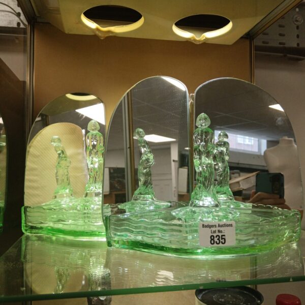 Vintage green glass dressing table set with candlestick holders and mirror.