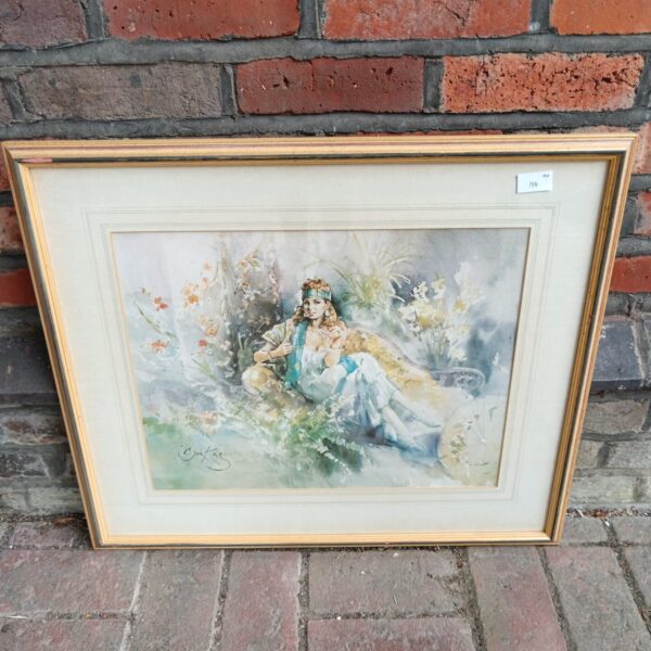 Framed vintage print of “The Lady of Mystery” by Gordon King.