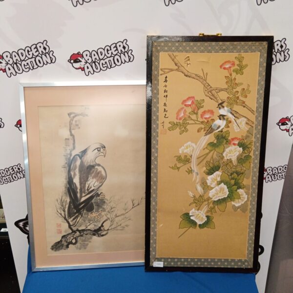 Vintage oriental painting of an eagle on a branch.