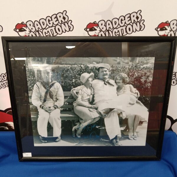 Vintage black and white photograph of Laurel and Hardy comedy duo.