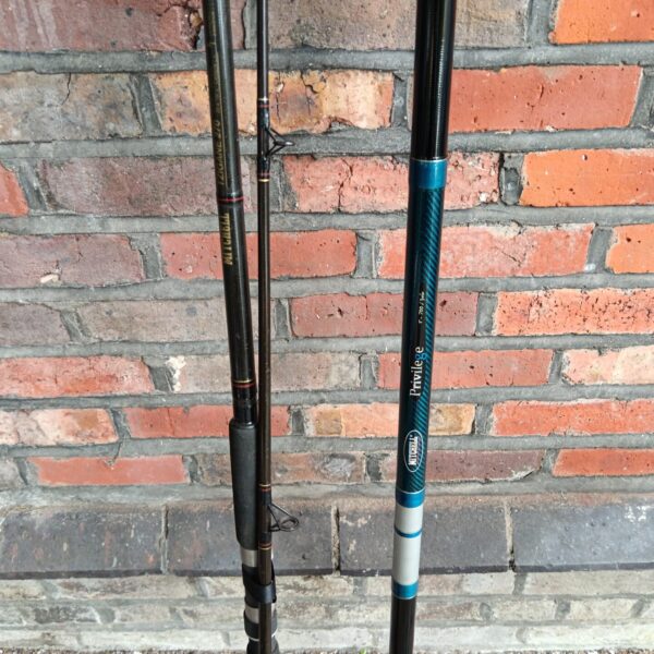 Vintage Mitchell Proton 70 fishing rod with blue detailing.