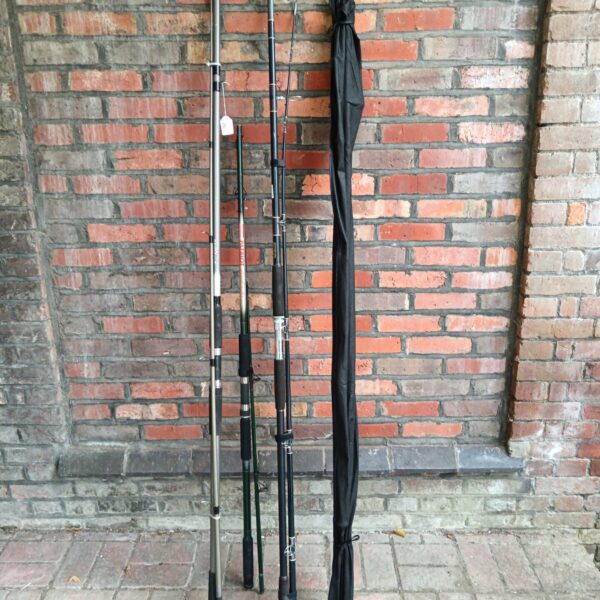 Lot of four sea fishing rods including Shakespeare and Sealey brands.
