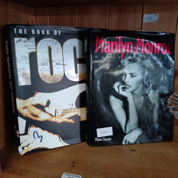 Vintage book cover featuring Marilyn Monroe and a guitar.