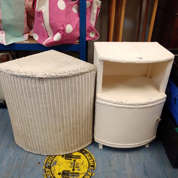 Vintage Lloyd Loom laundry basket and bedside table set for bedroom storage.
