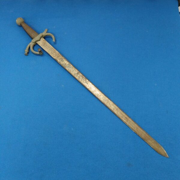 Vintage Spanish sword, Colada del Cid style, antique collectible weapon.