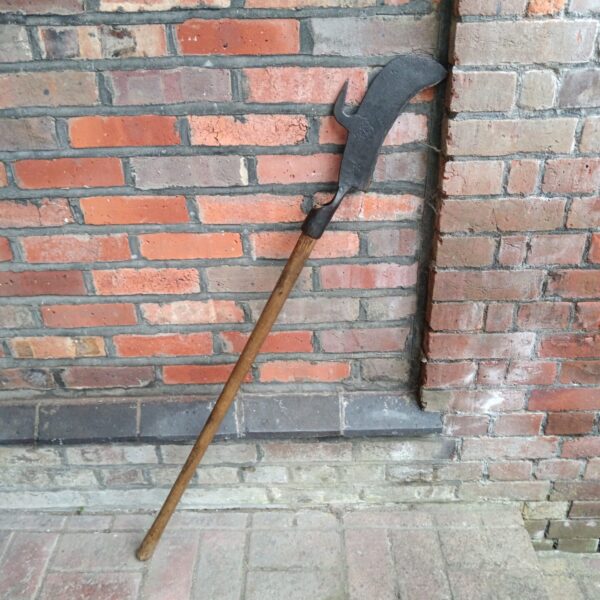 Antique halberd, a 16th-century polearm with axe blade and spear point.