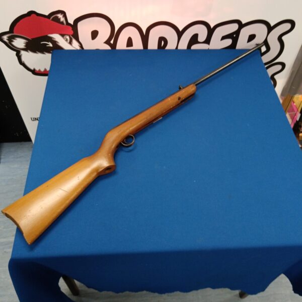 Vintage BSA Cadet Major .177 air rifle on a blue background.