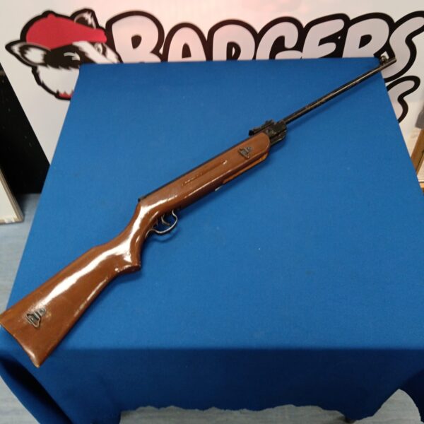 Vintage West Lake air rifle with wooden stock.