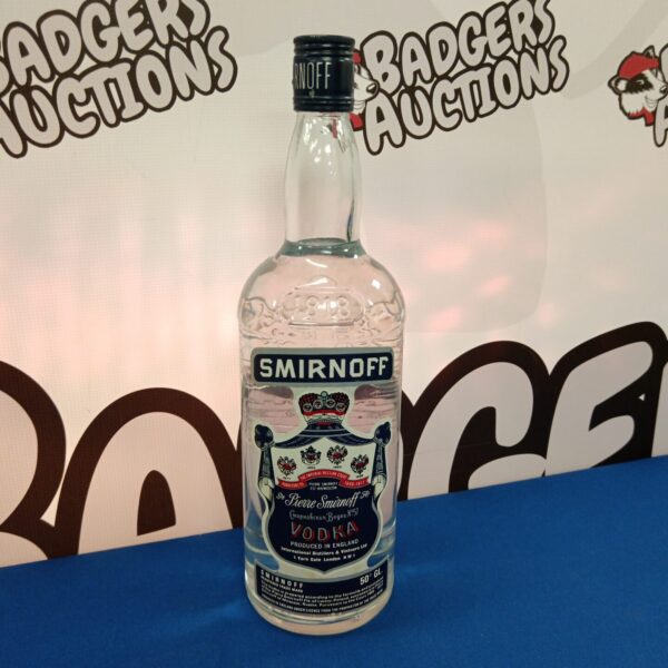 Vintage Smirnoff vodka bottle with classic label design.
