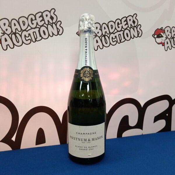 Fortnum & Mason Blanc du Blancs Grand Cru Champagne bottle presented for auction.