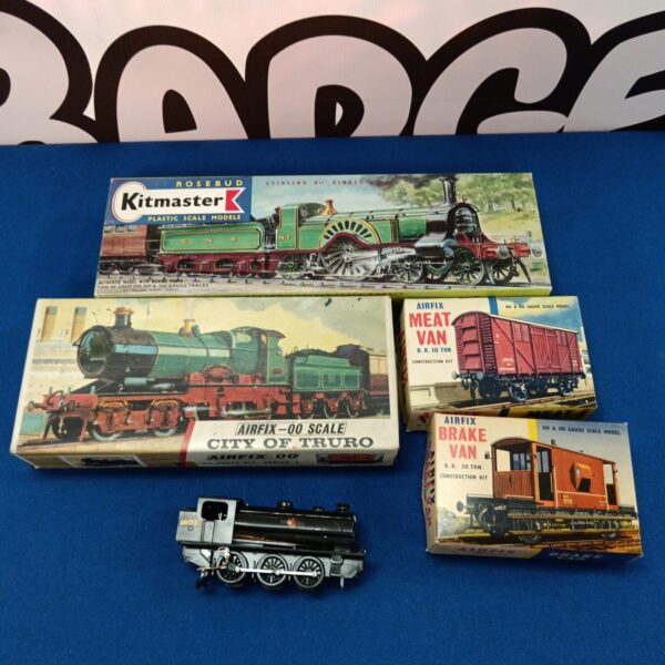 Vintage Airfix and Kitmaster train model kits in original boxes.