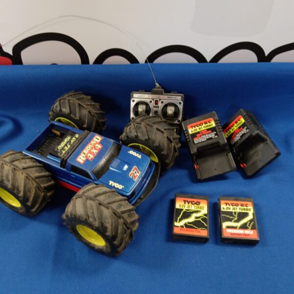 Vintage Tyco Rebound 4x4 RC car with remote control.
