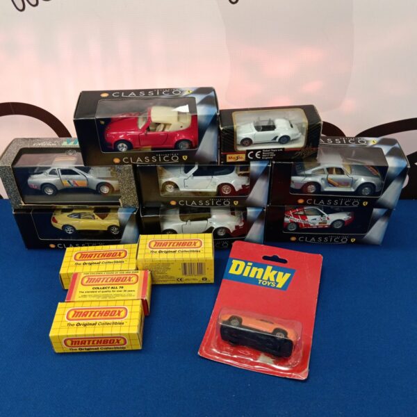 Lot of diecast model cars, including classic designs and Matchbox vehicles.