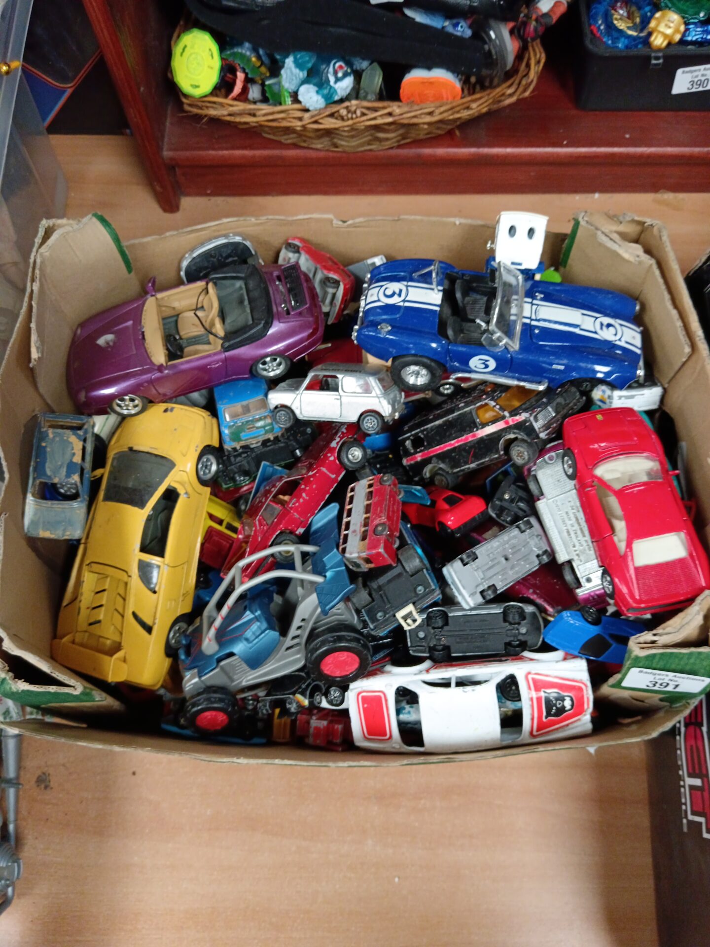 391 Box of diecast model cars including burago & corgi