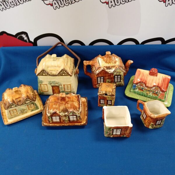 Vintage cottage ware collection featuring a teapot and sugar bowl.