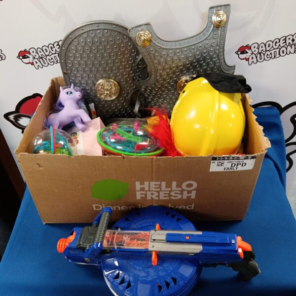 Children's toy bundle featuring a Nerf gun and fancy dress items.