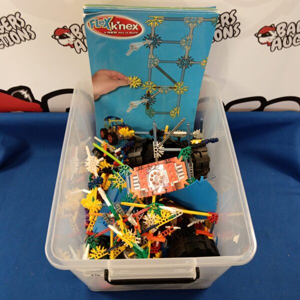 Colourful K'nex building toy lot with various pieces.