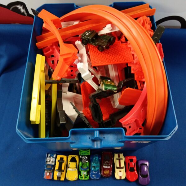 Hot Wheels track and cars lot, colourful toy vehicles and playset.
