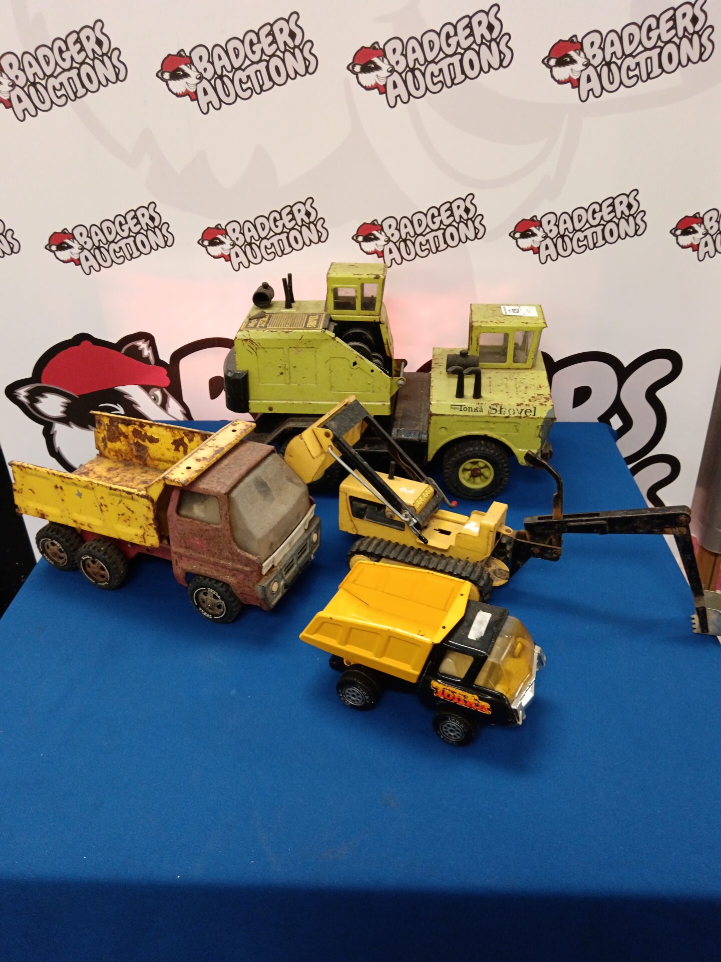428 Four vintage tin Tonka toys
