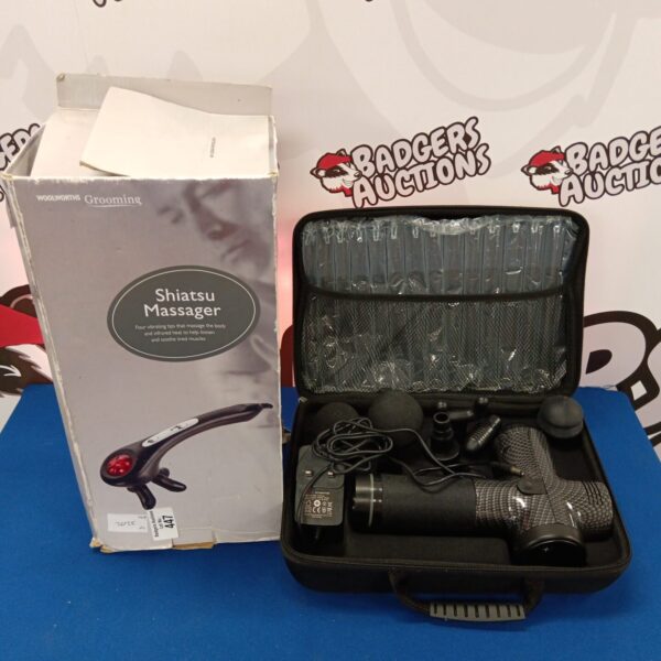 Portable Shiatsu massager in a hard carrying case for muscle relief.