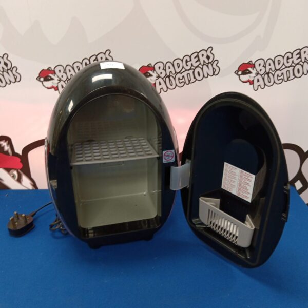 Black egg-shaped mini fridge for desk or personal use.