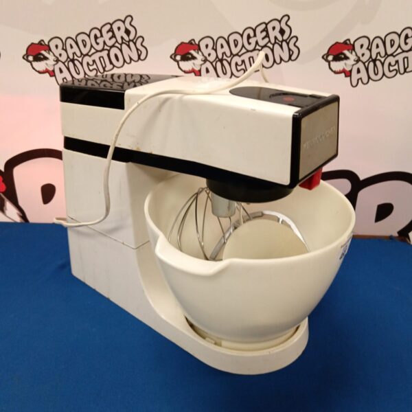 White vintage Kenwood Chef mixer for kitchen use.