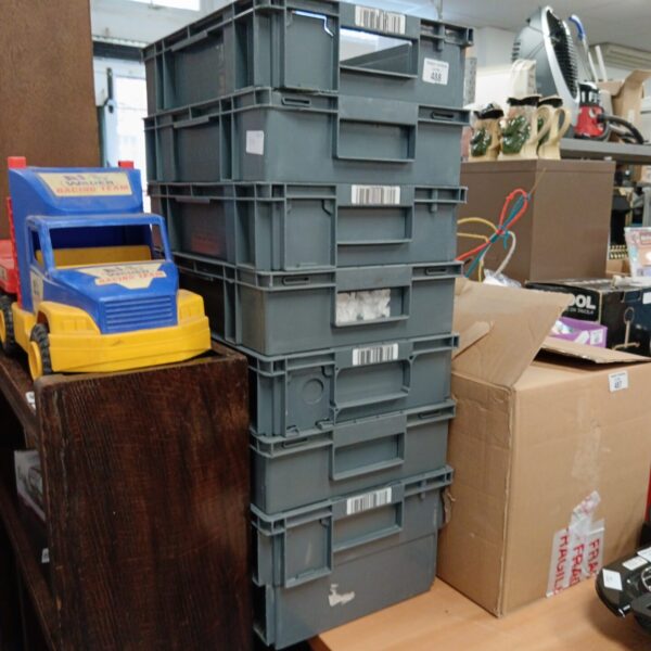 Lot of seven Royal Mail storage crates stacked together.