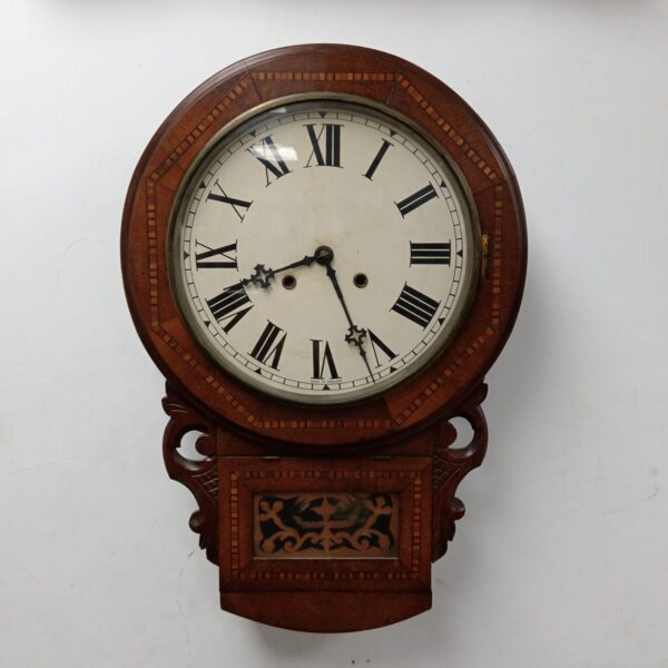 Antique American inlaid striking wall clock, detailed vintage timekeeping.